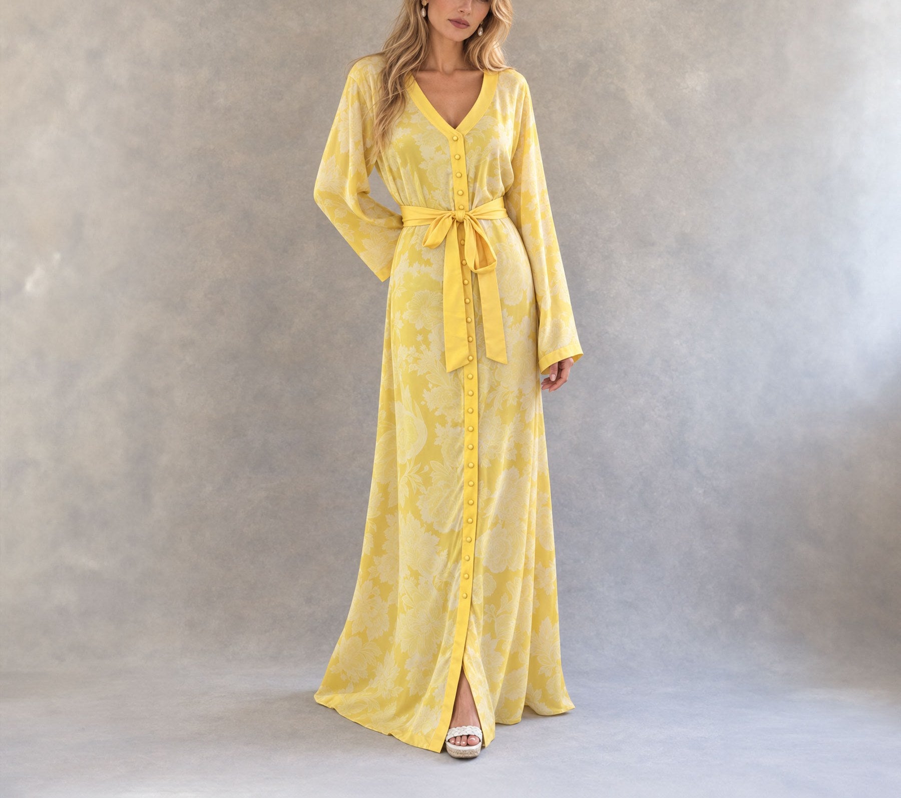 The Sol Return kaftan buttoned and belted, full length