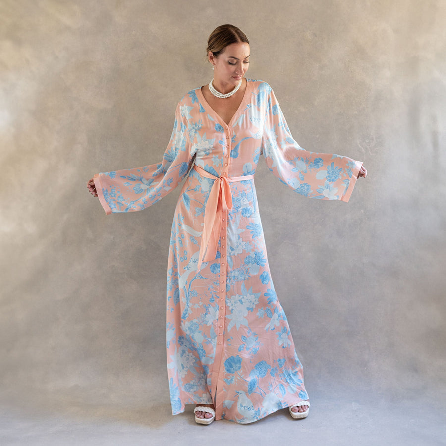 Zula Kaftan in Sunwake, peach with blue botanicals, full length front
